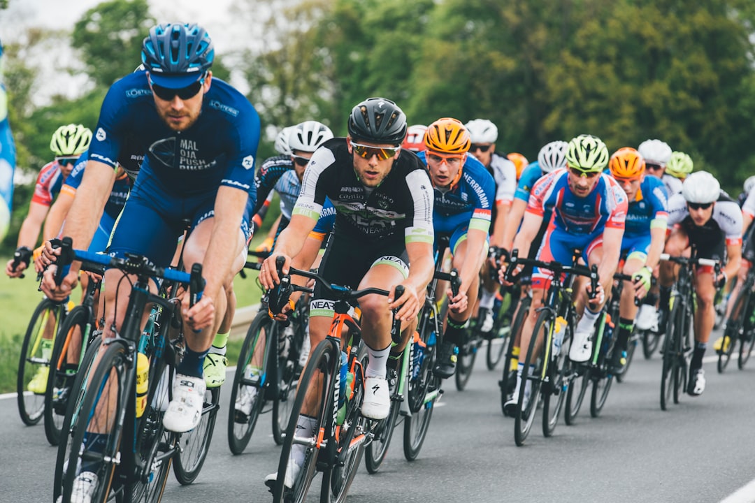 Road cyclists riding together on race bicycles